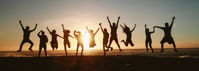 Happy people in sunset