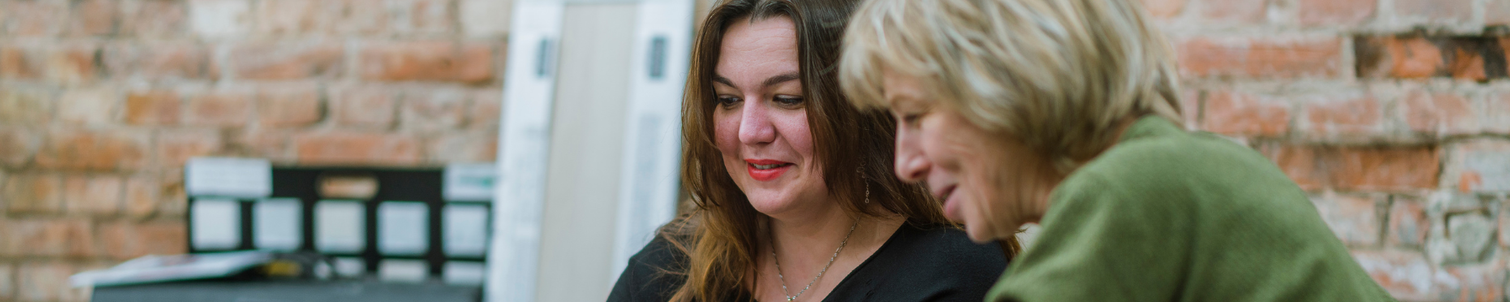 Adviser helping a customer who is over 50.