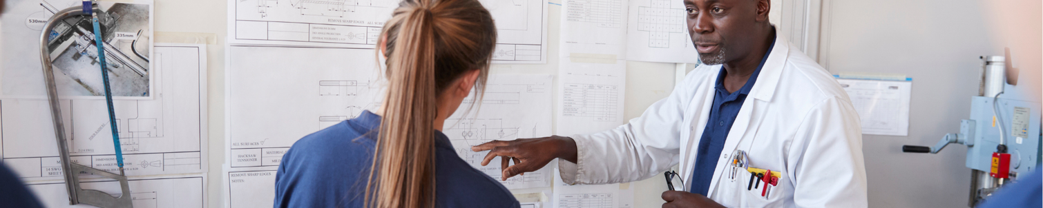 An apprentice learning on the job.