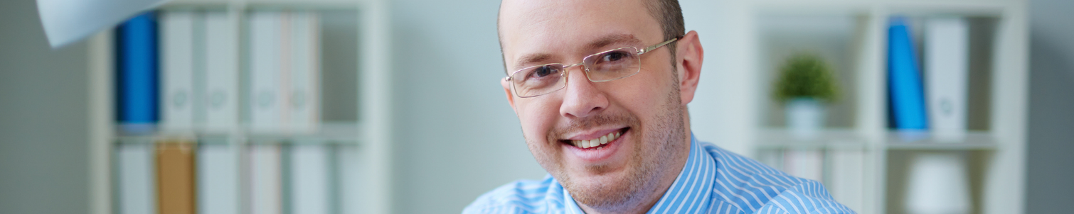 Employer sitting at his desk