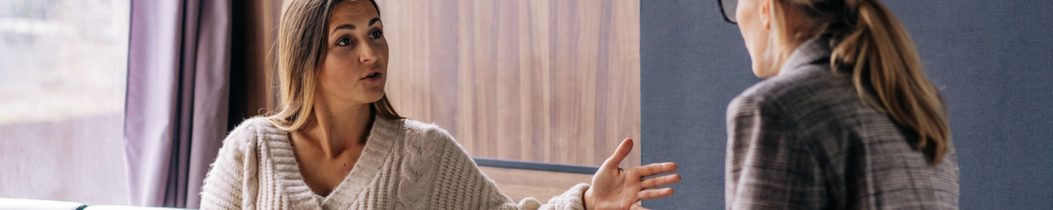 An adviser talking with a customer who needs career advice.