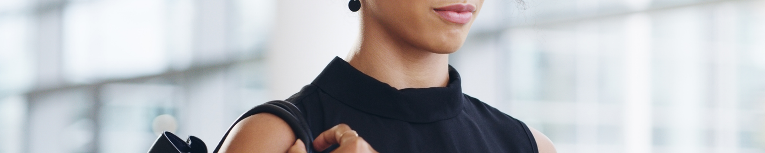 A confident woman walking to work