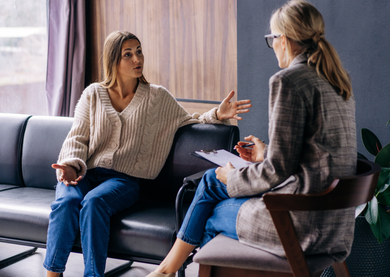 An adviser talking with a customer who needs career advice.